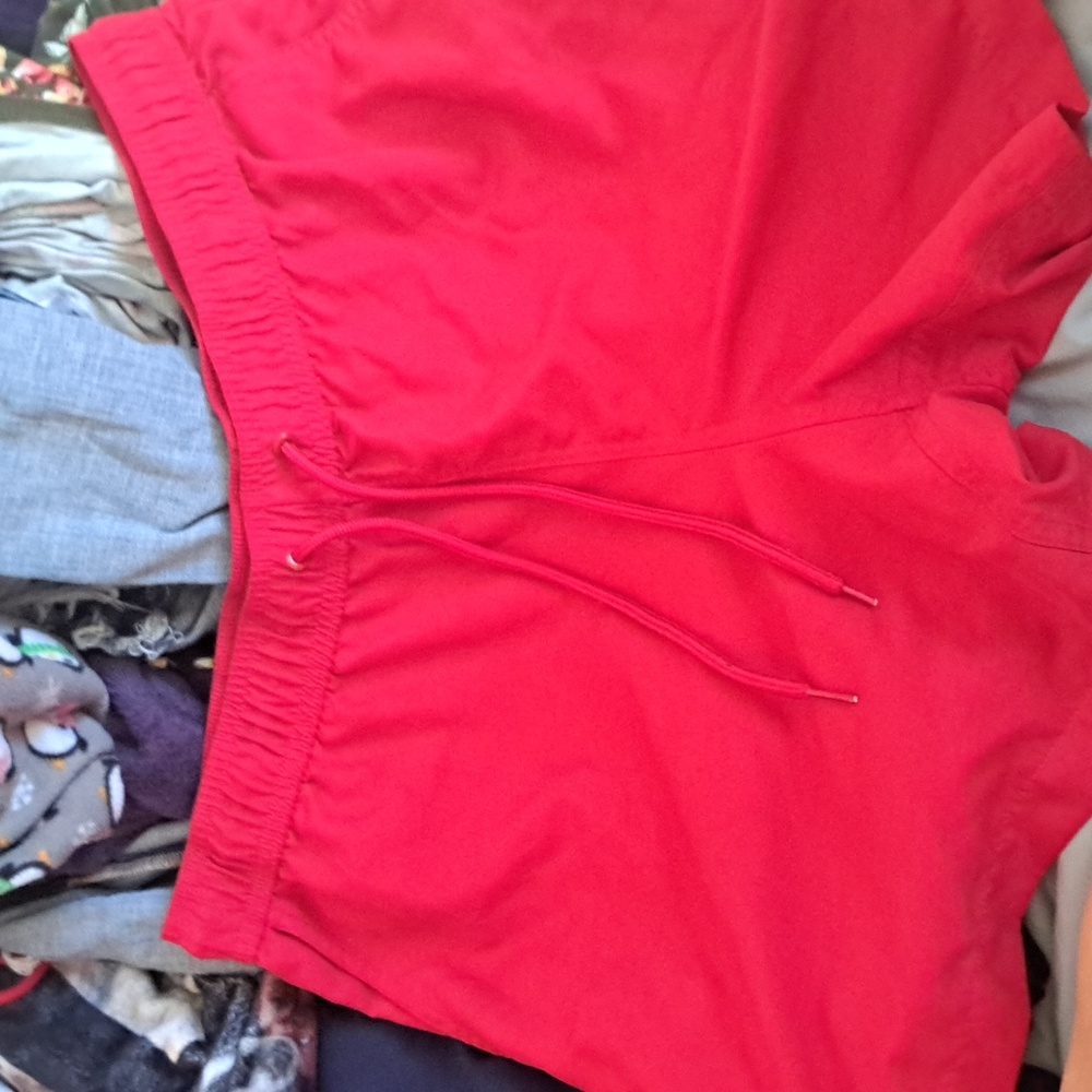 Red swim shorts